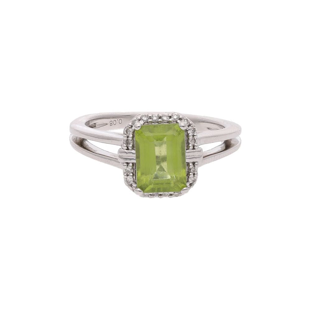 Lot 478: Platinum Peridot and Diamond Ring.