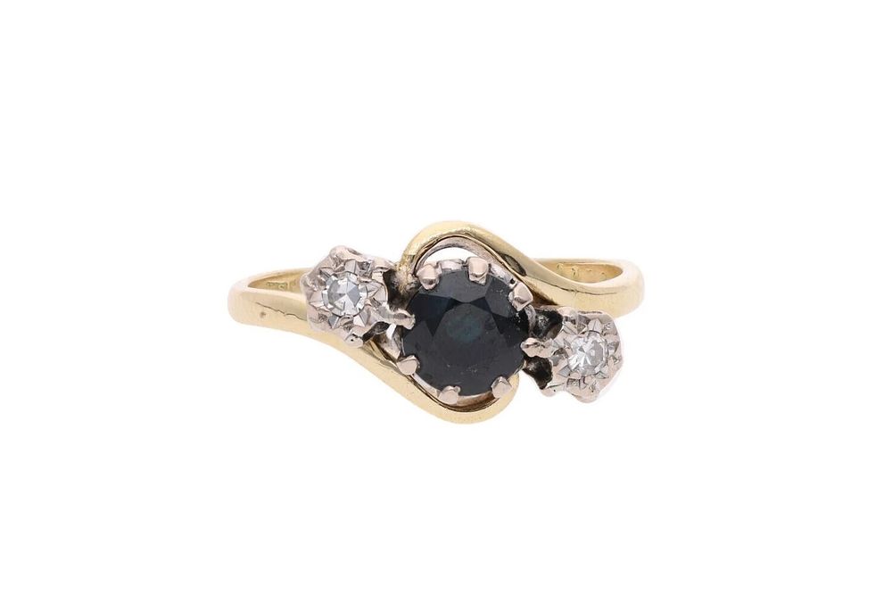 Lot 487: 18ct Gold Sapphire and Diamond Three Stone Ring, Size Q.