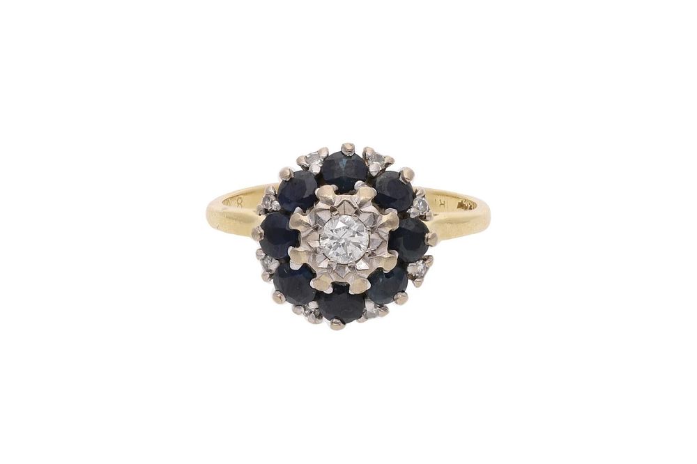 Lot 502: 18ct Gold Sapphire and Diamond Cluster Ring, Size K.
