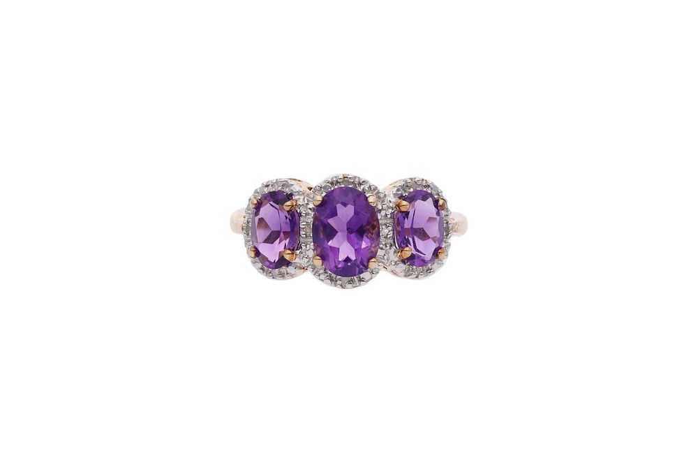 Lot 503: 9ct Gold Amethyst and Diamond Three Stone Ring, Size P.