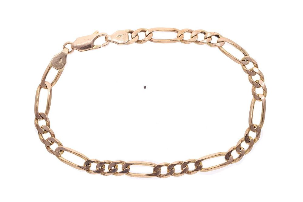 Lot 515: 9ct Gold Figaro Chain Bracelet, 8.25 Inches.