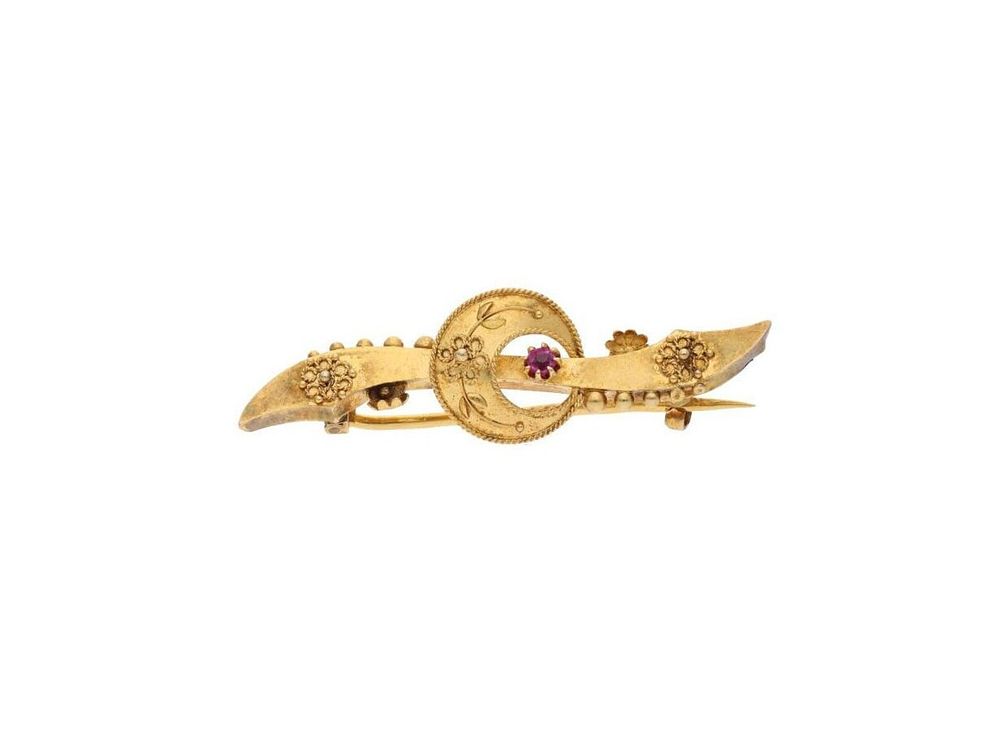 Lot 519: Antique 15ct Gold and Ruby Brooch.