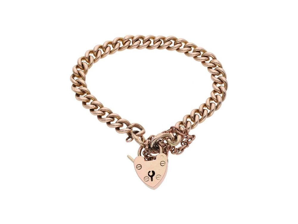 Lot 527: Small 9ct Rose Gold Heart Padlock Charm Bracelet.