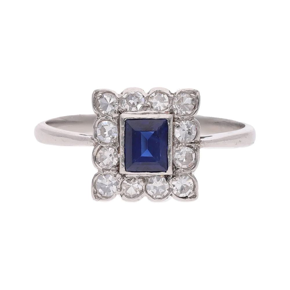 Lot 585: Platinum Sapphire and Diamond Cluster Ring, Size M.