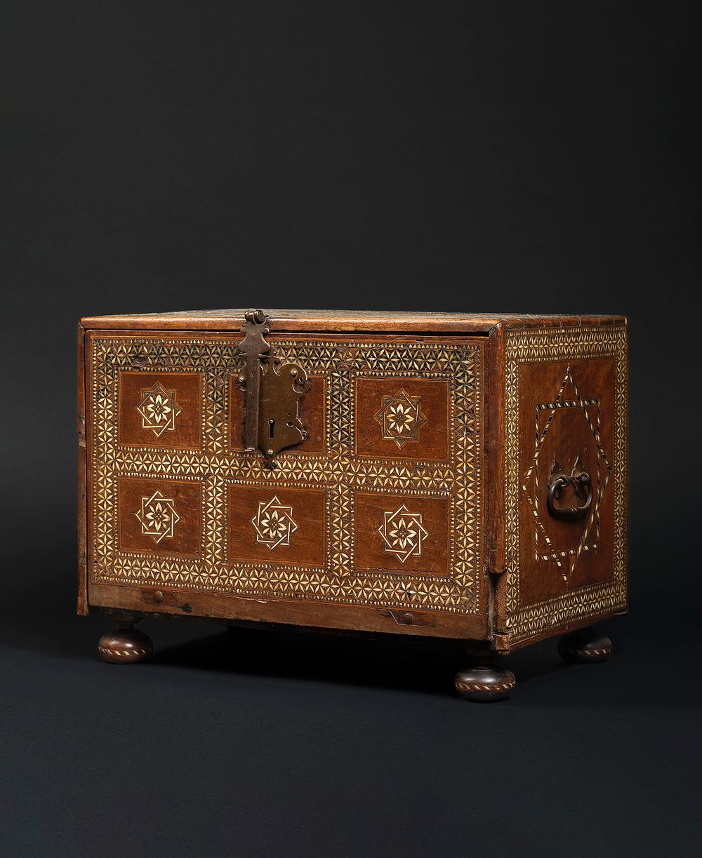 Lot 174: A FINE NASRID OR POST-NASRID FALL-FRONT WOODEN CABINET, SPAIN, LATE 15TH/16TH CENTURY