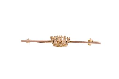 9ct Gold Crown Brooch 
HALLMARKS: marked for 9ct Gold 
MEASUREMENT: 44mm long by 7mm wide 