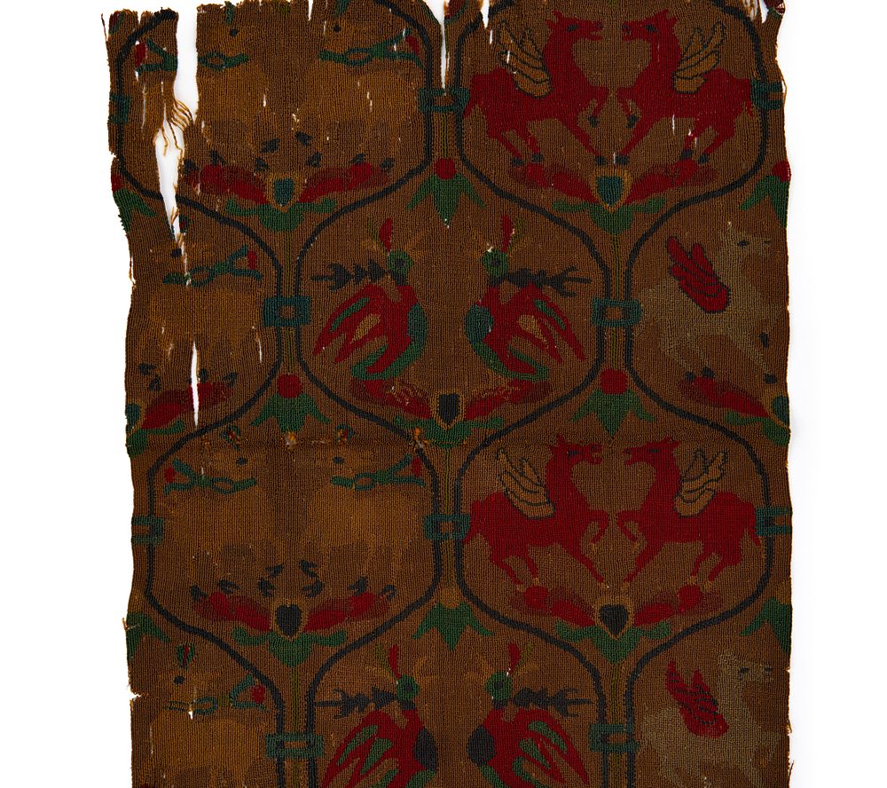 Lot 209: A SOGDIAN SILK SAMITE FRAGMENT WITH WINGED HORSES, CENTRAL ASIA, 7TH-9TH CENTURY