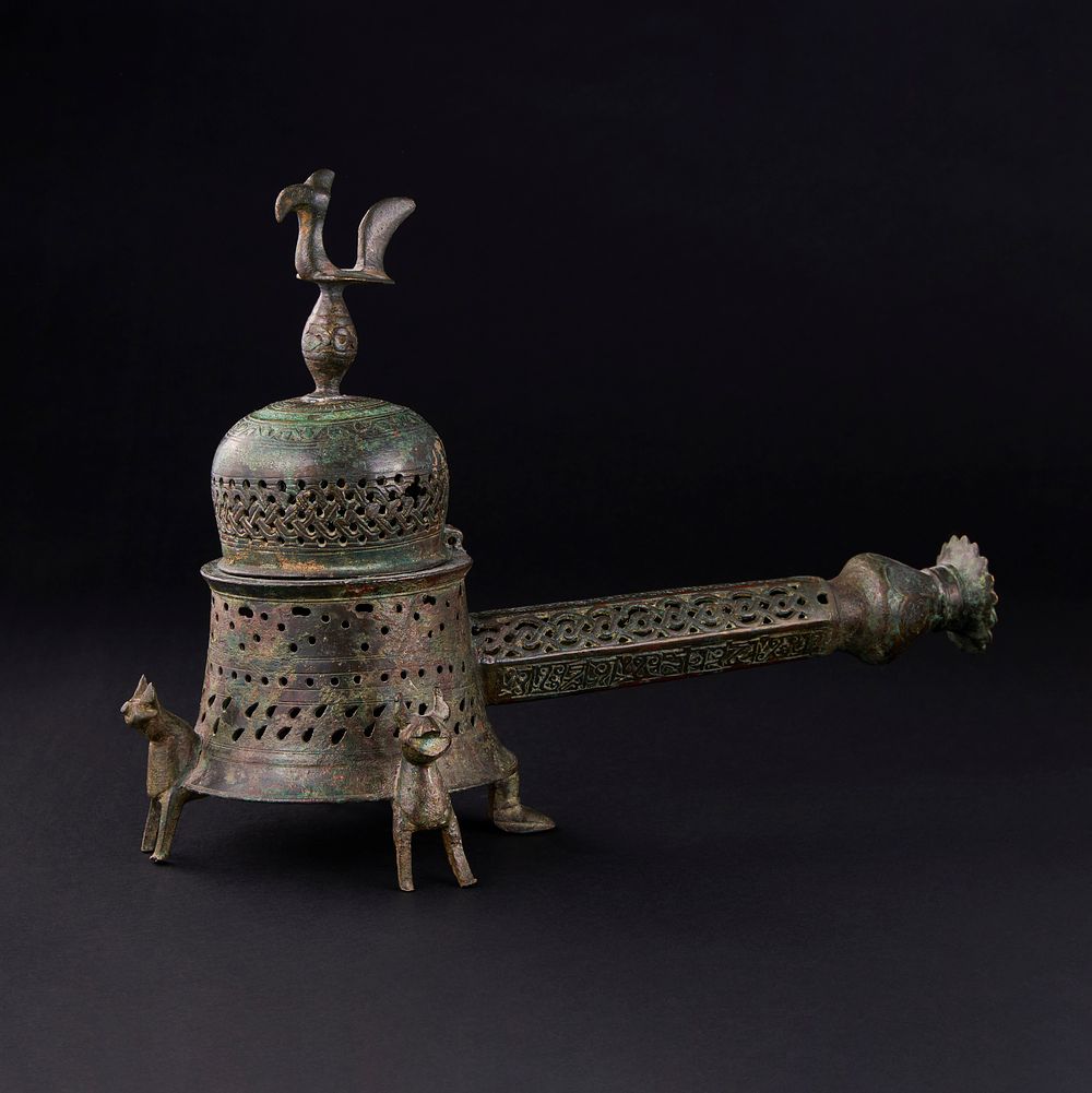 Lot 158: A RARE FATIMID BRONZE INCENSE BURNER, EGYPT, 10TH-12TH CENTURY