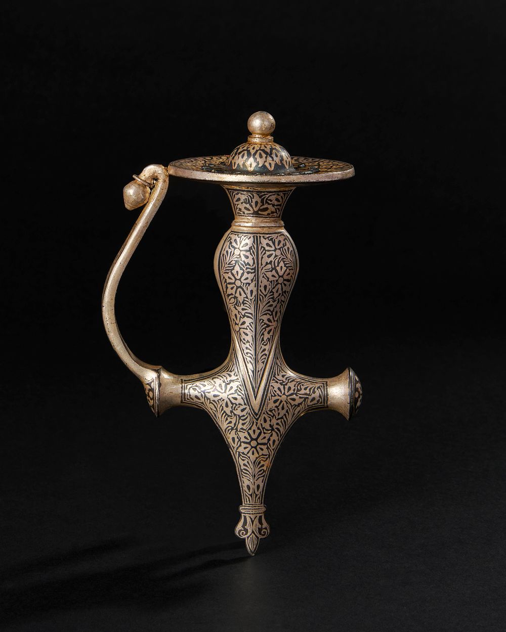 Lot 195: A SILVER TALWAR HILT, PUNJAB, 19TH CENTURY OR LATER
