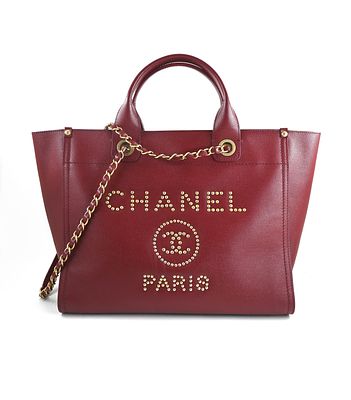 A Red Chanel Deauville PM Tote. Chanel Deauville PM Tote in Red, 33cm. 
Hardware: Gold 
Leather: 