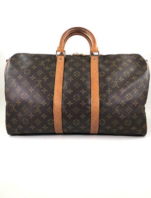 Louis Vuitton Keepall Bag . Louis Vuitton Keepall, 45cm. 
Hardware: Gold 
Leather: Leather