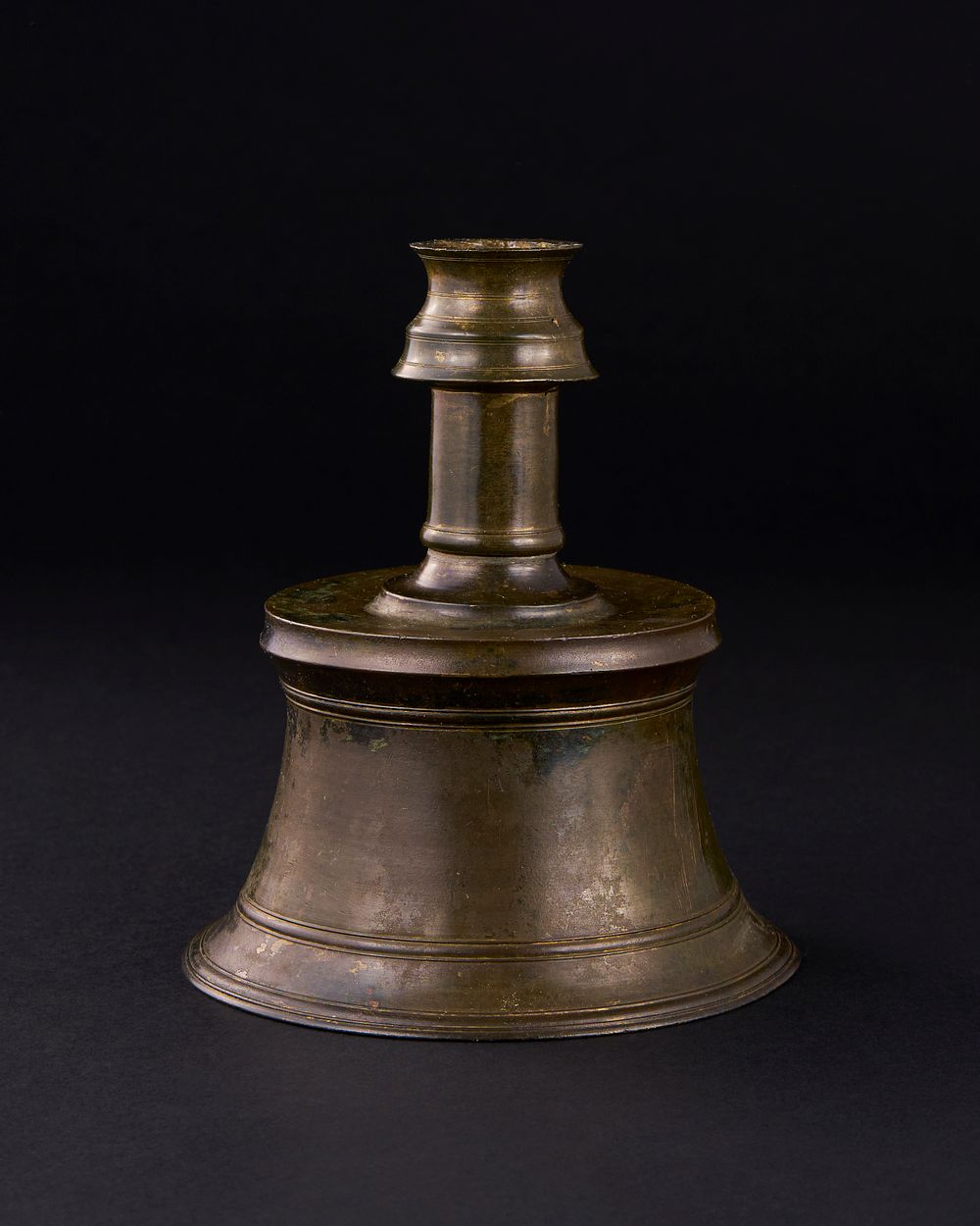 Lot 161: A TIMURID BRONZE CANDLESTICK, IRAN, 15TH CENTURY