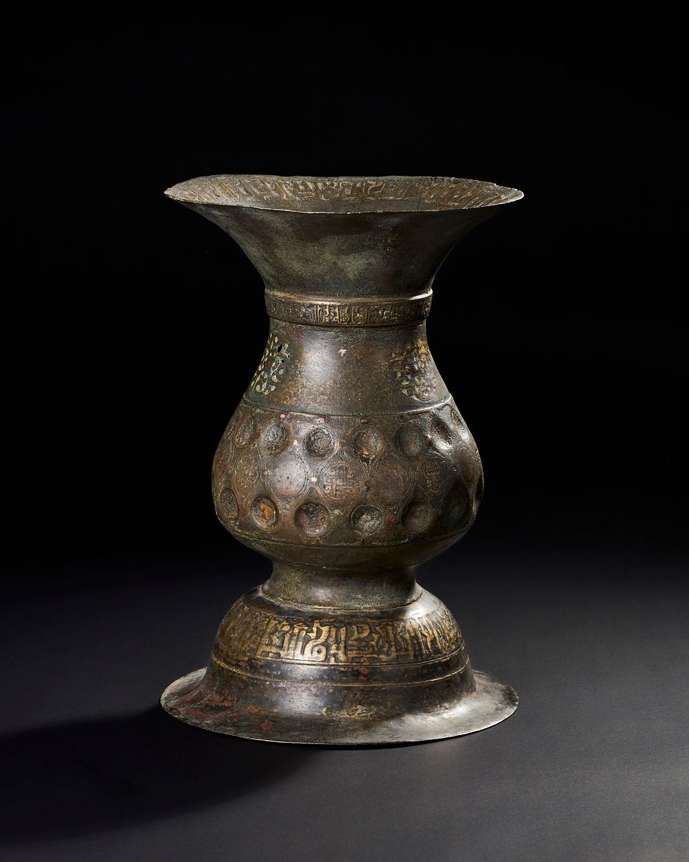 Lot 165: A LARGE 12TH-13TH CENTURY PERSIAN SELJUK COPPER-INLAID BRONZE VASE WITH FINE KUFIC CALLIGRAPHY