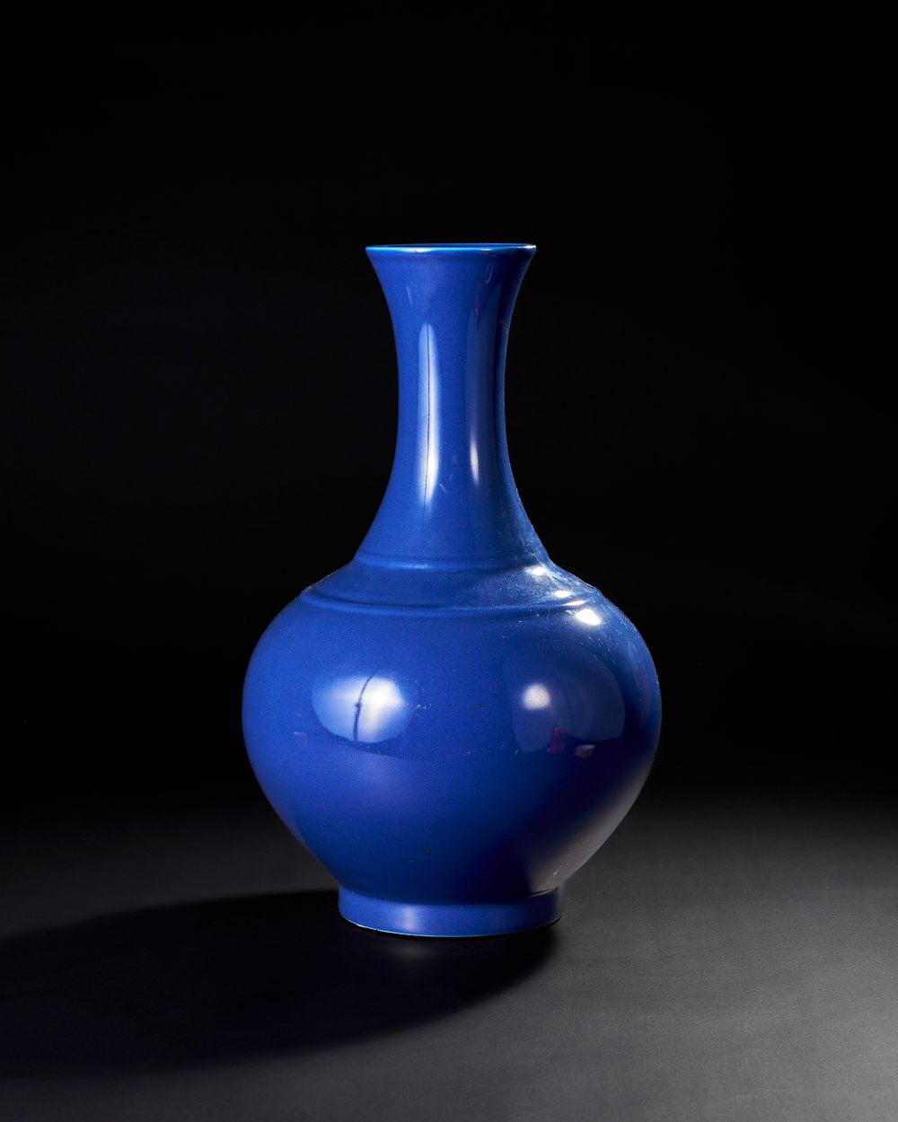 Lot 219: BLUE-GLAZED BOTTLE VASE, LATE QING DYNASTY TO REPUBLIC PERIOD, 19TH-20TH CENTURY