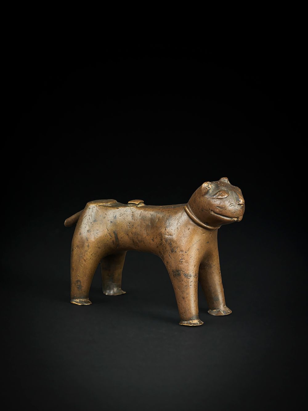 Lot 239: FATIMID BRONZE DOOR KNOCKER IN THE FORM OF A FELINE, 9TH - 10TH CENTURY