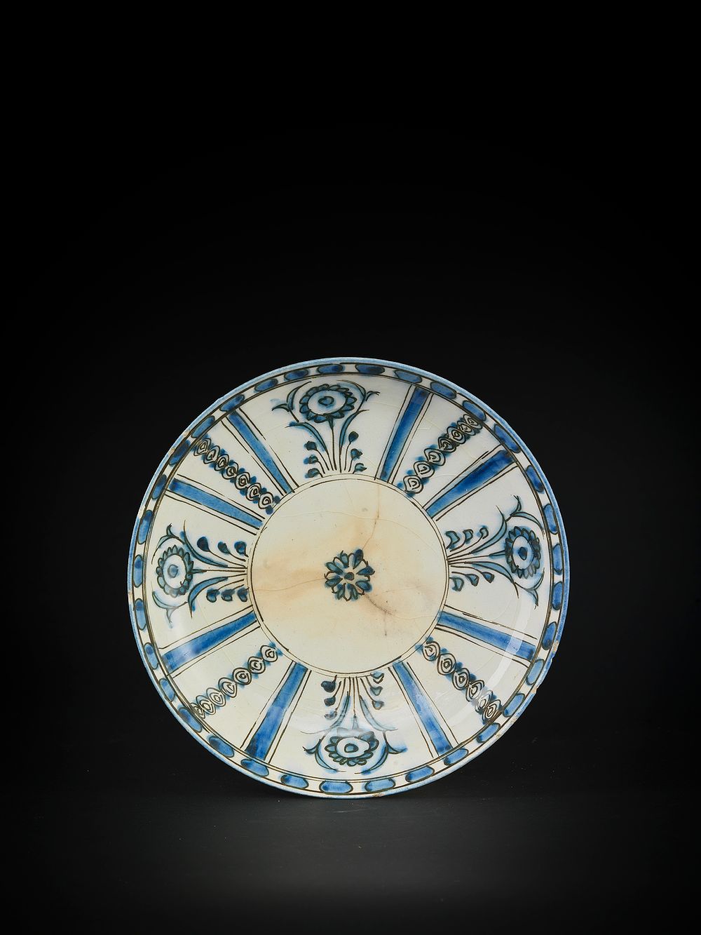 Lot 197: A SAFAVID POTTERY DISH, IRAN 18TH CENTURY