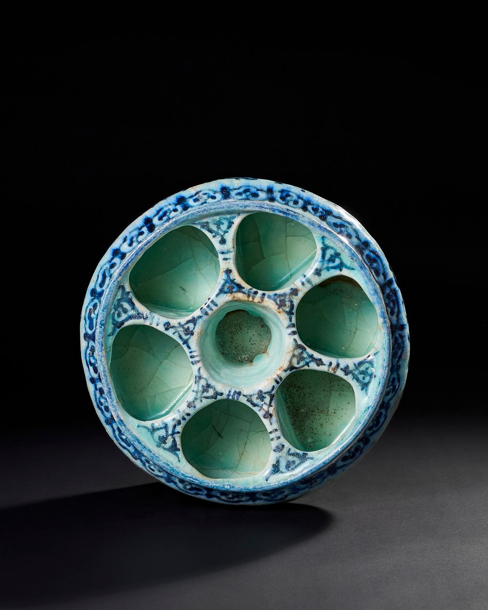 Lot 163: AN UNUSUAL 15TH-16TH CENTURY PERSIAN TIMURID OR EARLY SAFAVID GLAZED POTTERY SECTIONAL BOWL