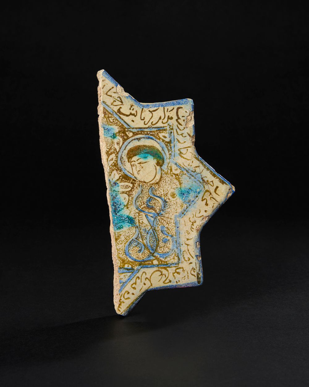 Lot 153: A FRAGMENTARY LUSTRE STAR TILE, 12TH/ 13TH CENTURY