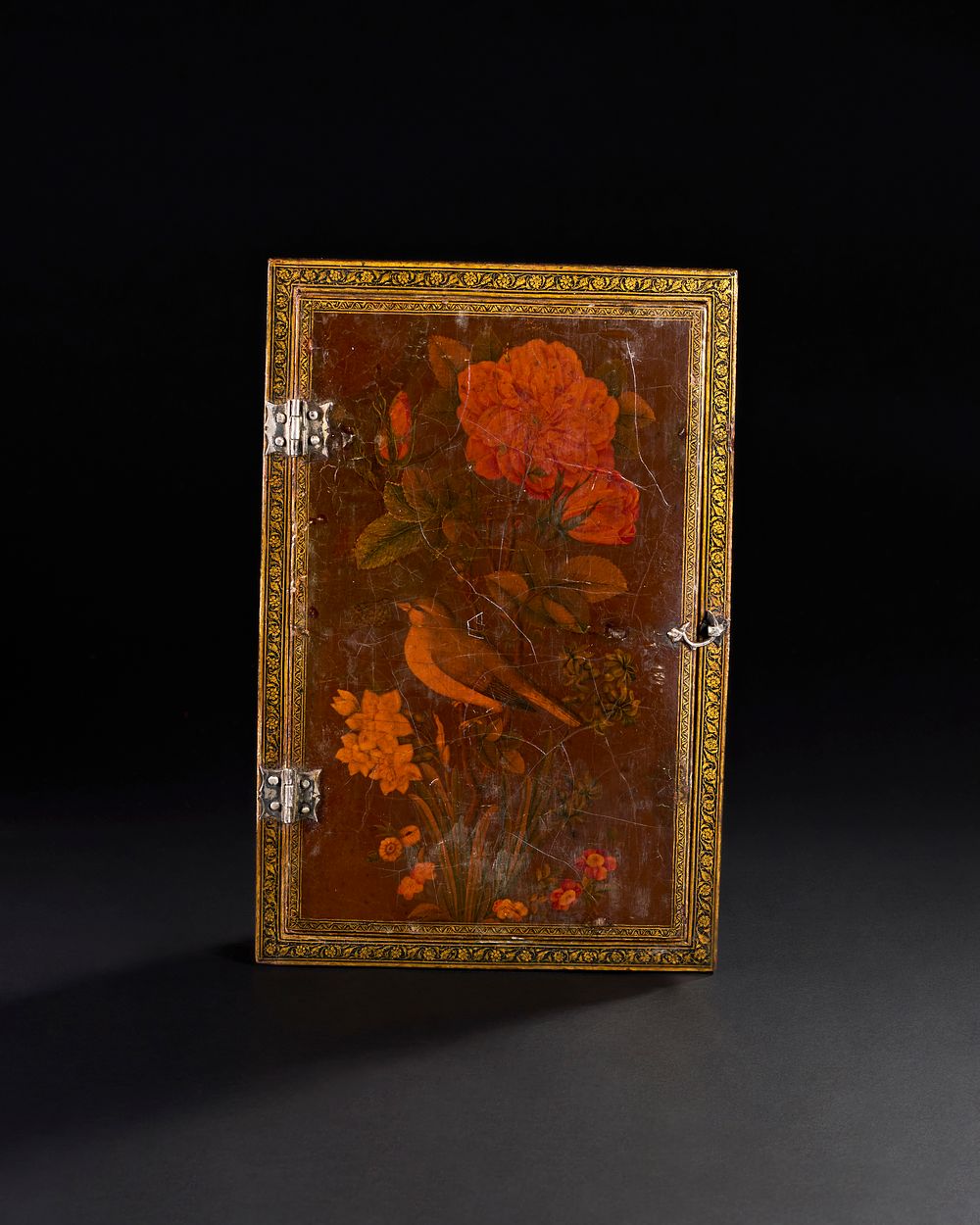 Lot 152: A QAJAR LACQUER MIRROR CASE SIGNED MUHAMMAD BAQIR, DATED AH 1239/ A.D. 1823-4