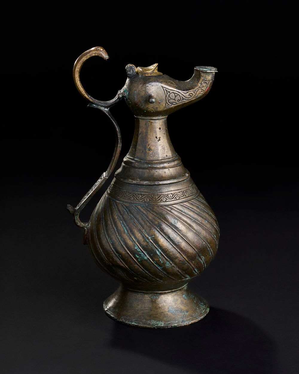 Lot 229: A BRONZE SELJUK EWER, 13TH CENTURY