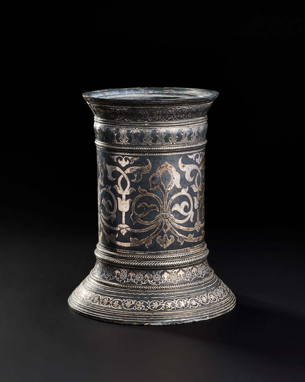 Lot 259: AN UNUSUAL LARGE INDIAN SILVER INALID BIDRI TORCH STAND / CANDLESTICK, 18TH - 19TH CENTURY