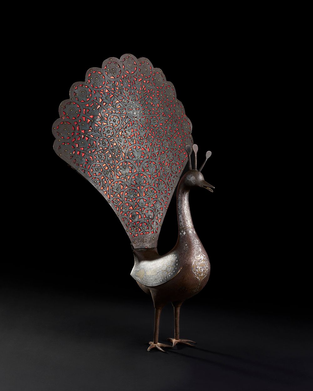 Lot 261: A LARGE QAJAR SILVER AND GOLD INALID STEEL PEACOCK, PERSIA, 19TH CENTURY
