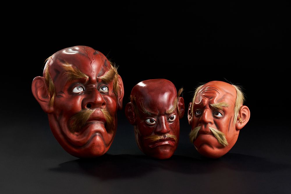Lot 283: A THREE JAPANESE LACQUER FACE MASKS, MEIJI PERIOD