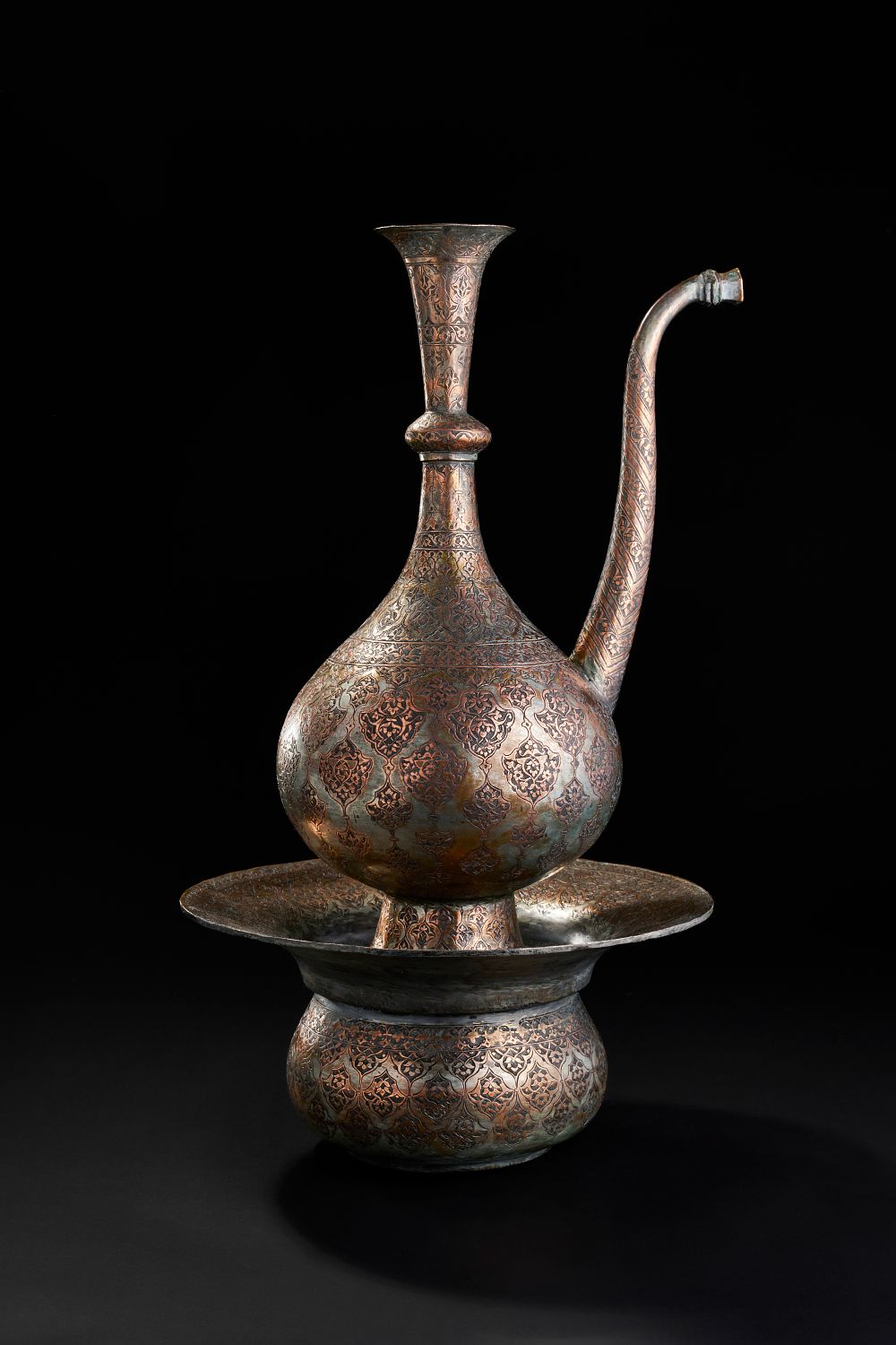 Lot 235: AN ENGRAVED COPPER EWER AND BASIN, PERSIA, 19TH CENTURY