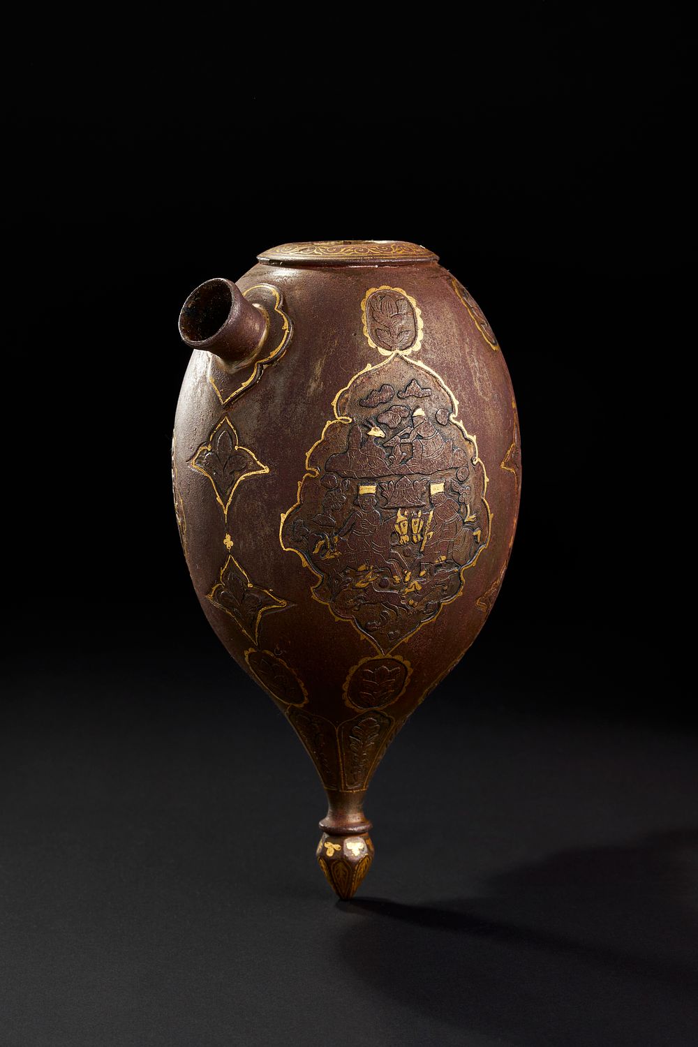 Lot 303: A QAJAR GOLD INALID ENGRAVED STEEL HUQQA BASE, 19TH CENTURY