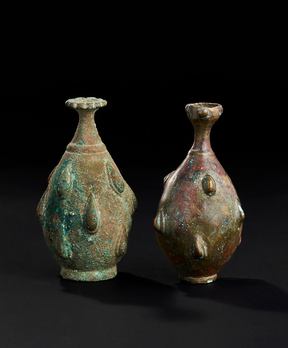 Lot 253: TWO SELJUK BRONZE ROSEWATER SPRINKLERS, PERSIA, 12TH -13TH CENTURY