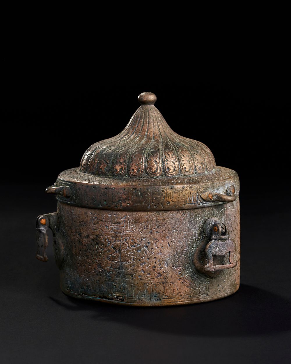 Lot 225: A LARGE SELJUK BRONZE INKWELL WITH OPEN WORKED INTERIOR, KHURASSAN, 13TH CENTURY