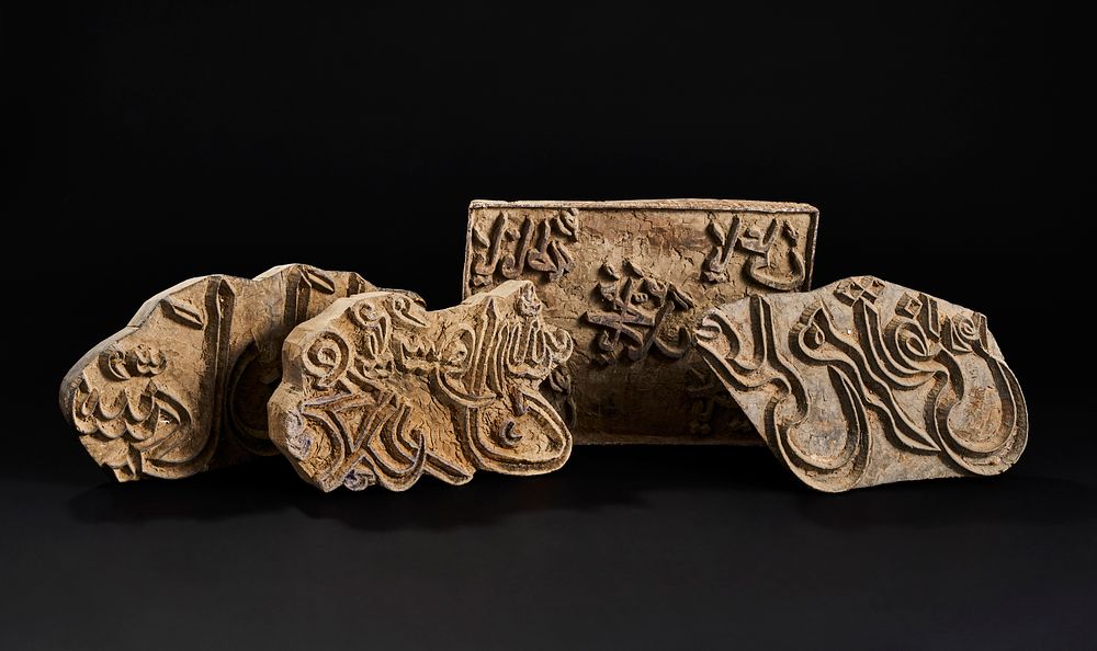 Lot 172: FOUR LARGE CARVED CALLIGRAPHIC WOODEN PRINTING BLOCKS, DECCAN, INDIA, 19TH CENTURY