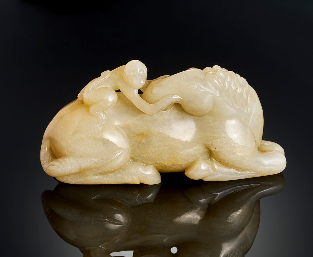 Lot 255: A CHINESE JADE FIGURE OF A HORSE, QING DYNASTY (1644-1911)