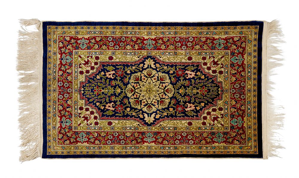 Lot 378: A TURKISH HEREKE SILK RUG