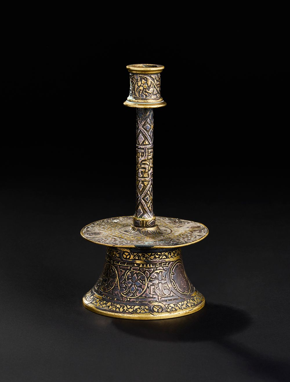 Lot 243: A VENETO SARACENIC STYLE ITALIAN CANDLE STICK FOR THE ISLAMIC MARKET