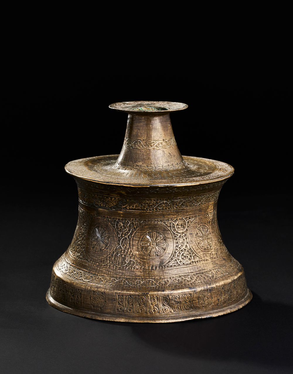 Lot 242: A SILVER INALID BRASS CANDLESTICK, PERSIA, 14TH CENTURY
