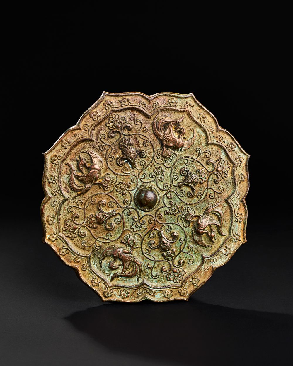 Lot 260: A LARGE CHINESE BRONZE LOBED MIRROR, TANG DYNASY
