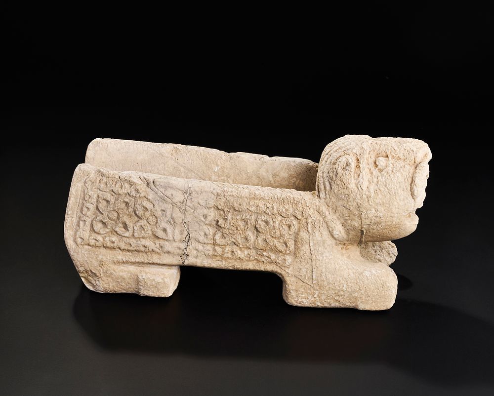Lot 171: A SPANISH CARVED MARBLE WATER SPOUT IN THE FORM OF A LION, 11TH-13TH CENTURY