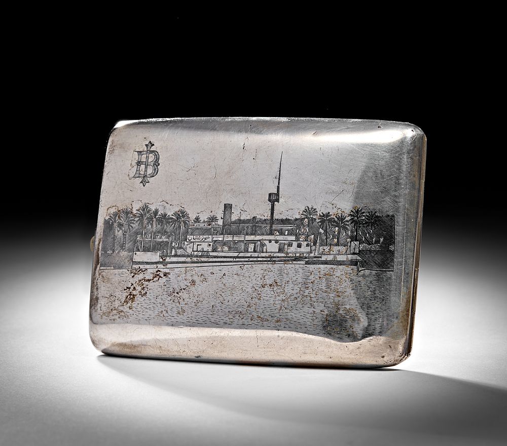 Lot 229: A 20TH CENTURY IRAQI SILVER AND NIELLO CIGARETTE CASE
