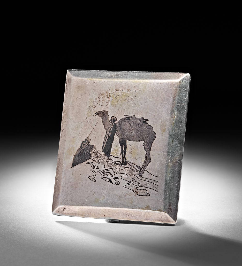 Lot 234: A 20TH CENTURY IRAQI SILVER AND NIELLO CIGARETTE CASE