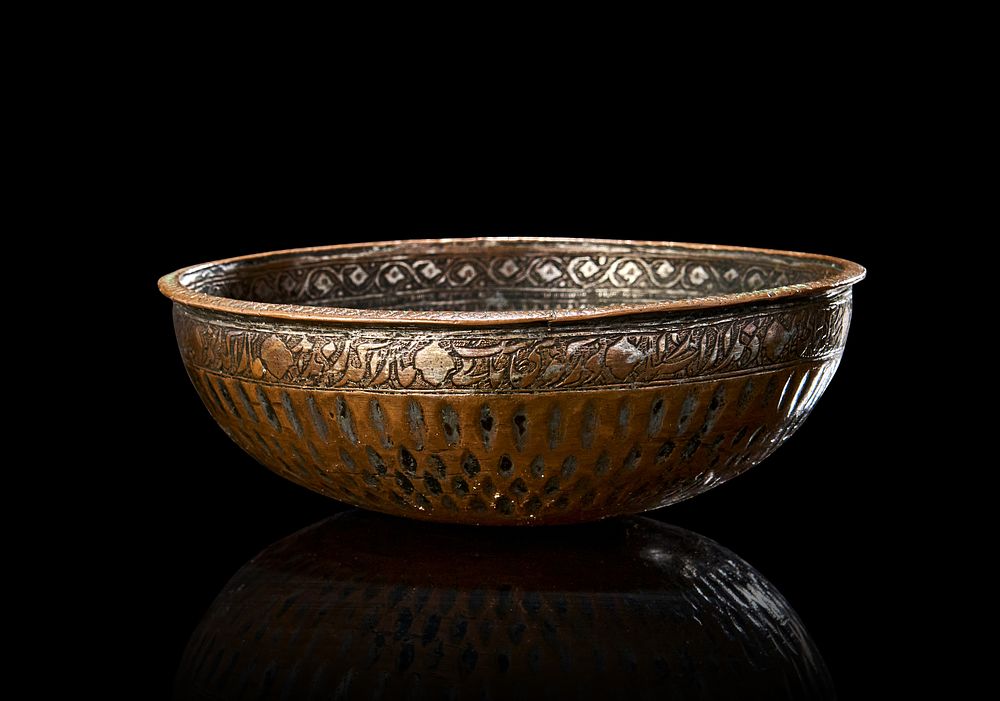 Lot 184: AN EARLY QAJAR METAL BOWL, 19TH CENTURY