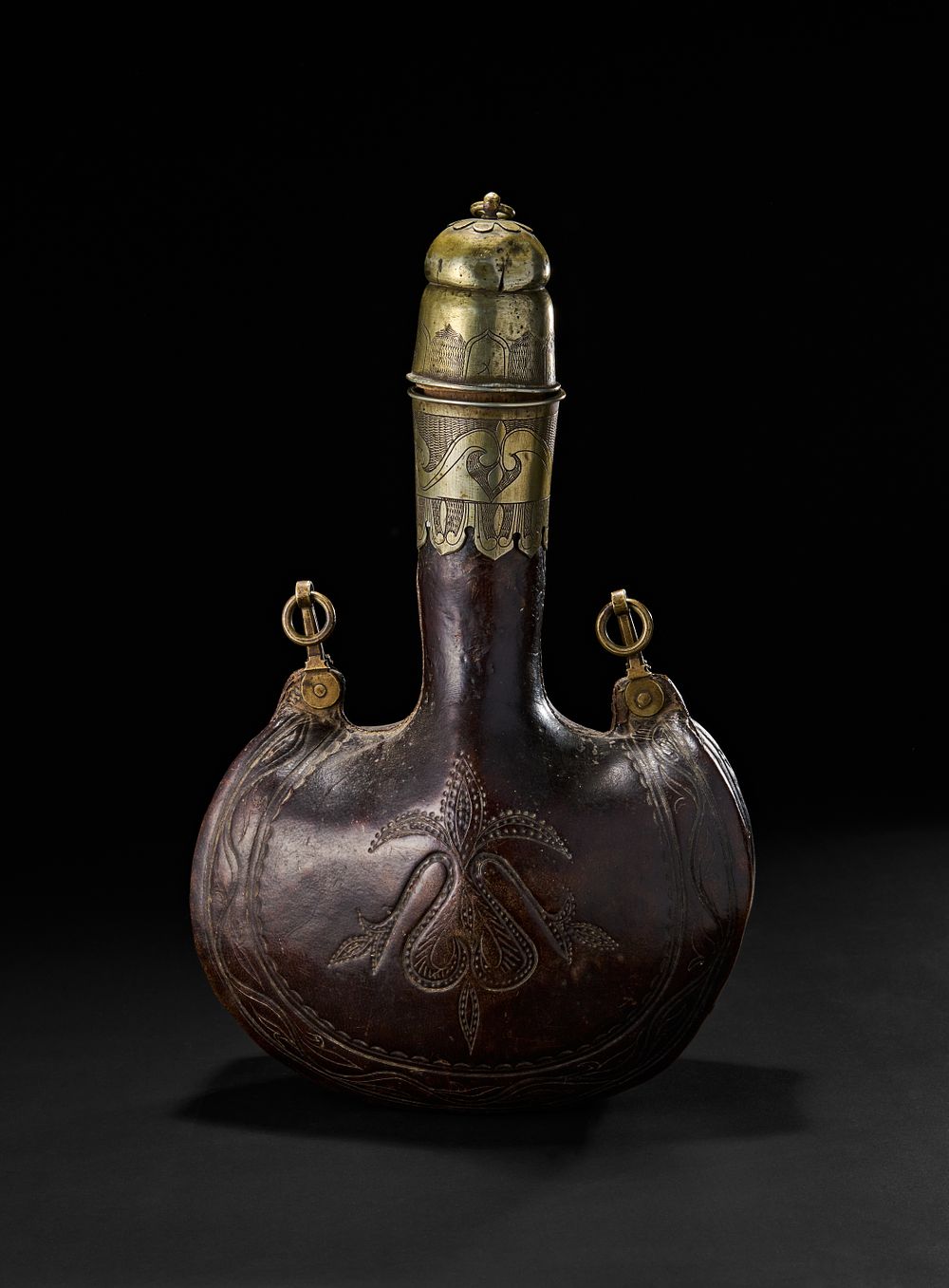 Lot 202: A VERY RARE OTTOMAN LEATHER WATER PILGRIM FLASK, 16TH - 17TH CENTURY