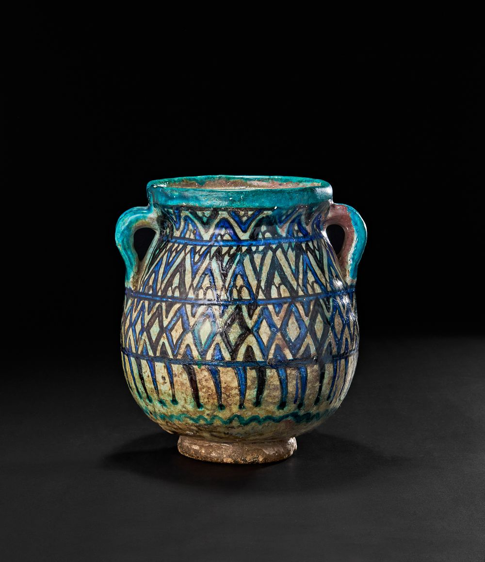 Lot 212: AN OTTOMAN DAMASCUS GLAZED POTTERY TWIN HANDLED VASE, 17TH CENTURY