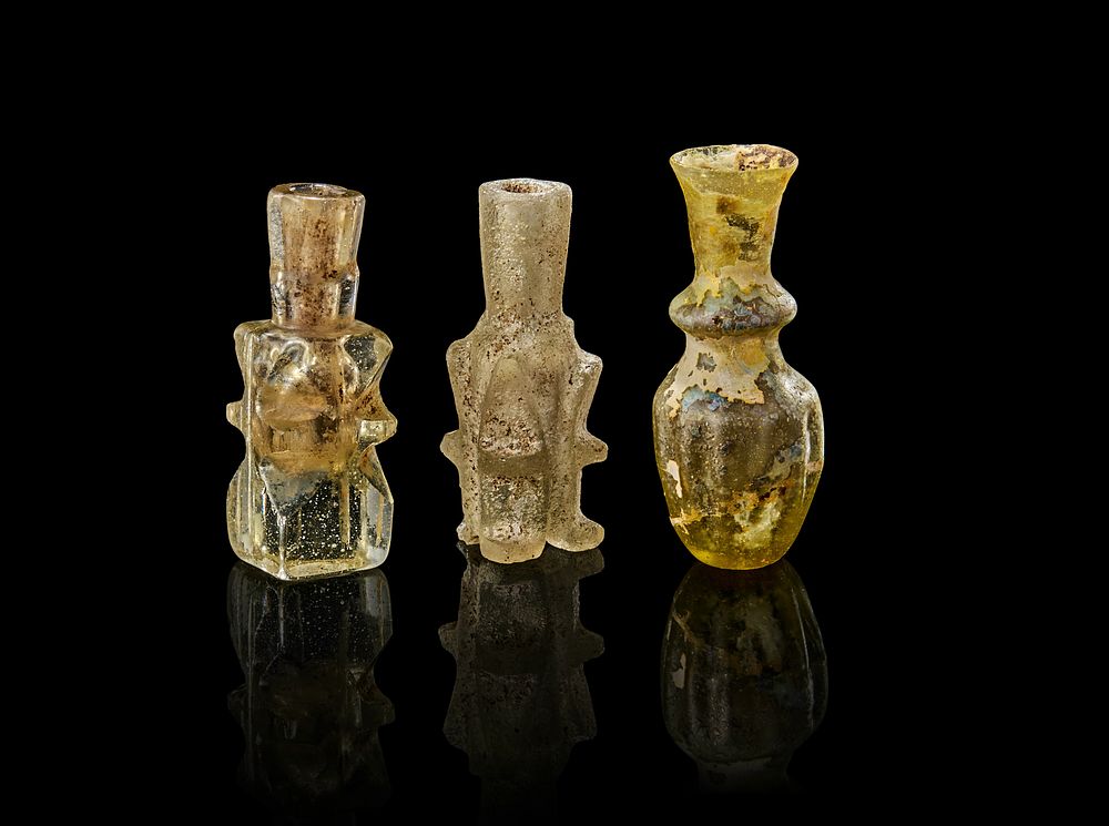 Lot 226: A TWO FATIMID GLASS MOLAR FLASK AND ANCIENT PERSIAN GLASS, 11TH - 12TH CENTURY