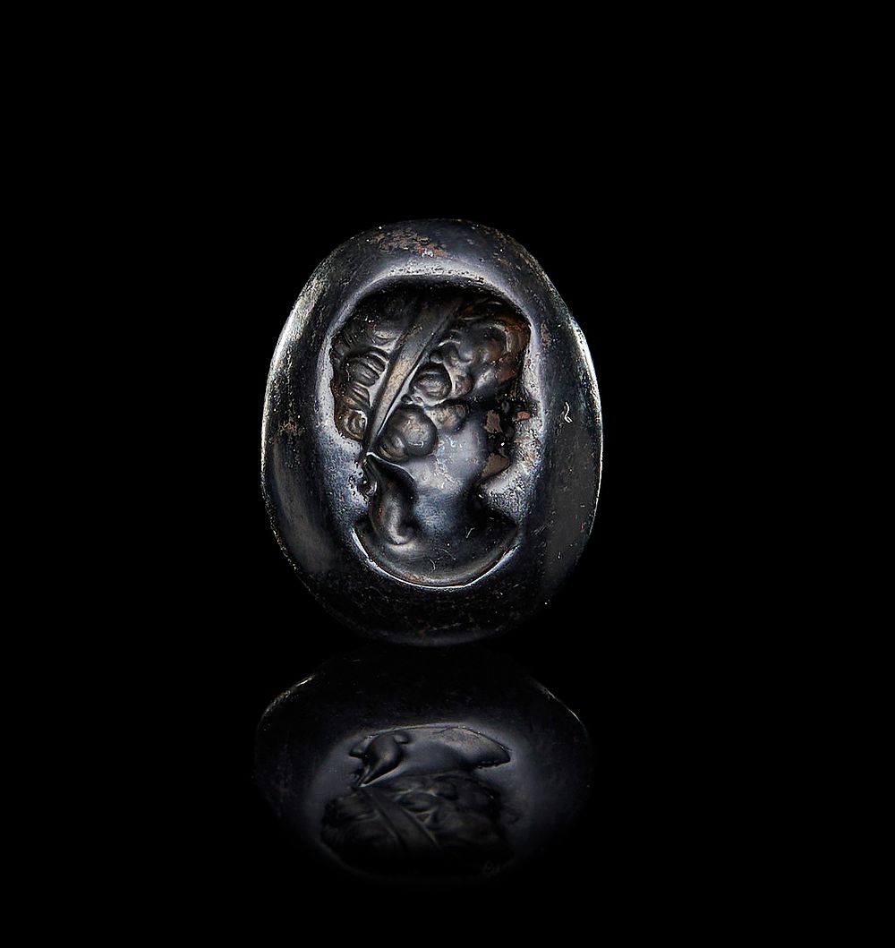 A BLACK STONE ROMAN INTAGLIO, CIRCA 1ST - 2ND CENTURY A.D. 
L: 1.7cm