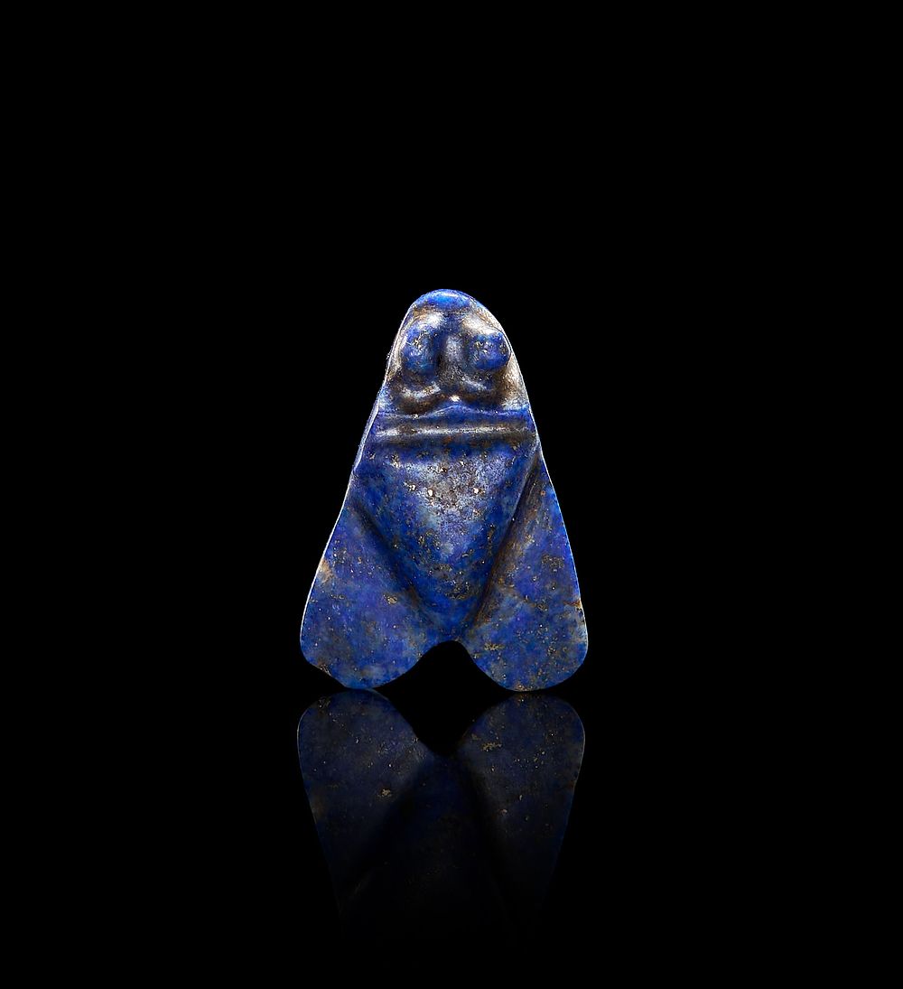 Lot 72: AN INSCRIBED LAPIS PENDANT IN THE FORM OF A FLY, HIEROGLYPHIC INSCRIPTION, EARLY PTOLEMAIC PERIOD