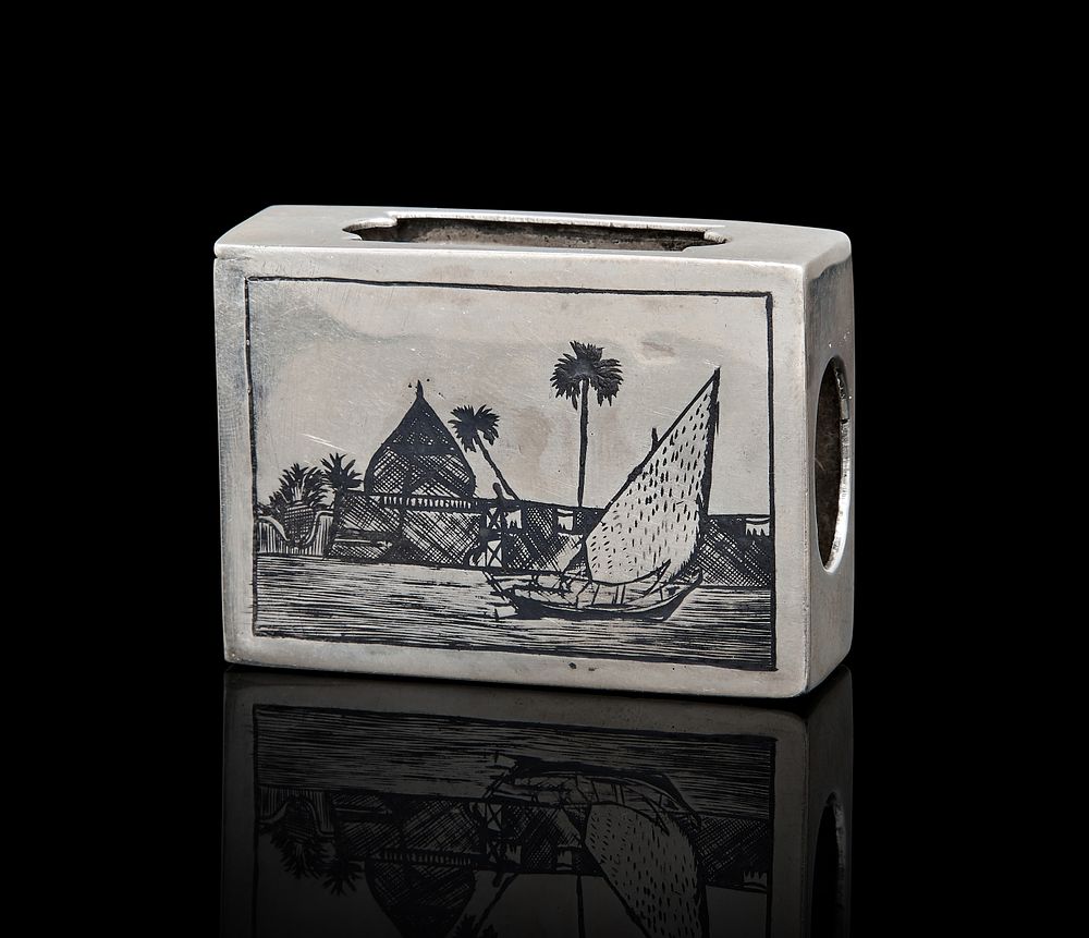 Lot 286: AN IRAQI NIELLO SILVER MATCH BOX, 20TH CENTURY