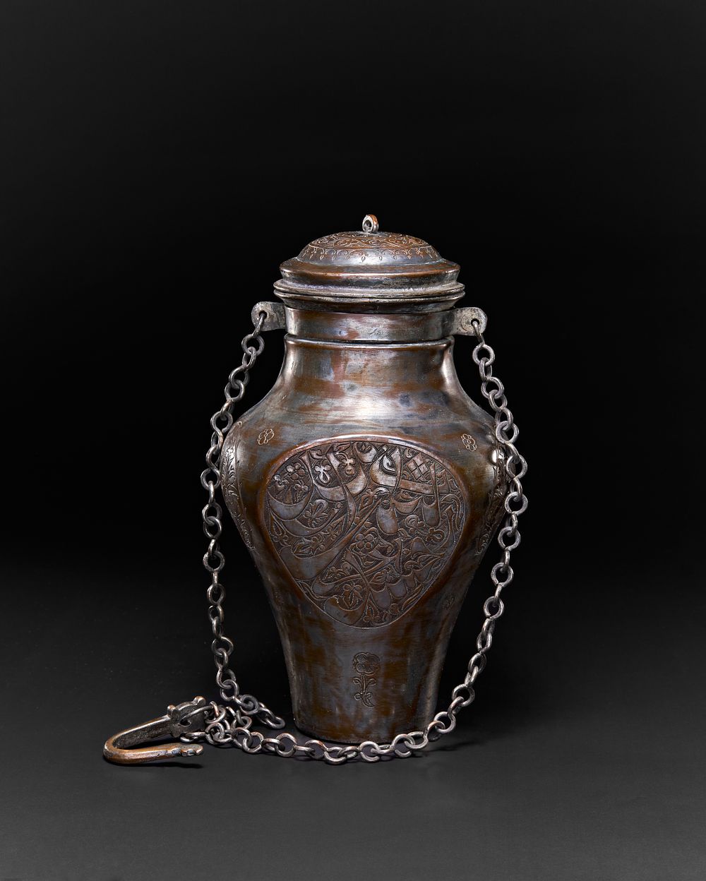 Lot 155: A PERSIAN TINNED COPPER HANGING VESSEL WITH A LID, TABRIZ, 19TH CENTURY