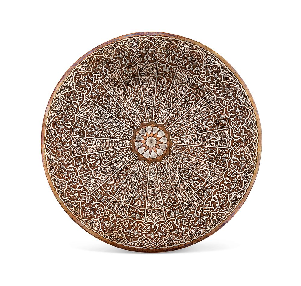 Lot 168: A SILVER INLAID COPPER TRAY, EGYPT OR SYRIA, CIRCA 1900