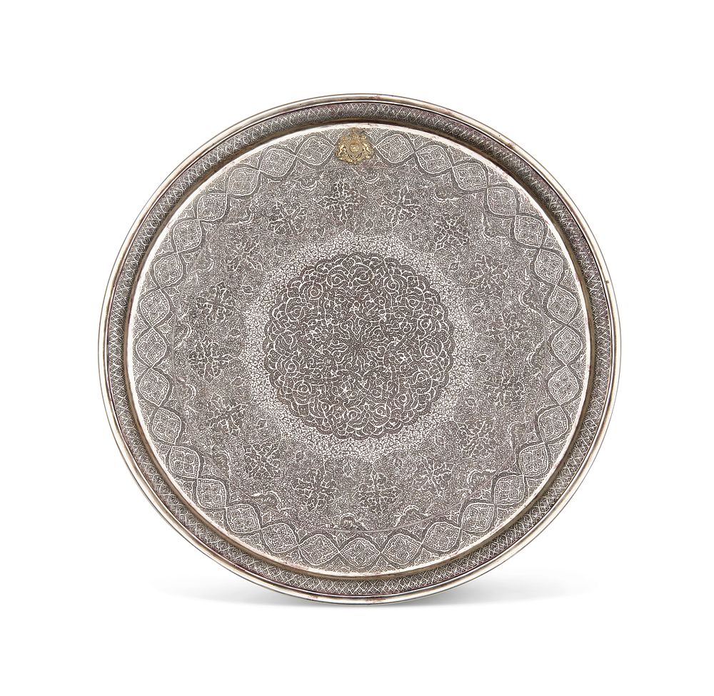 Lot 171: A LARGE COMMEMORATIVE ROUND ENGRAVED PERSIAN SILVER TRAY ATTRIBUTED TO MOHAMMED TAQI
